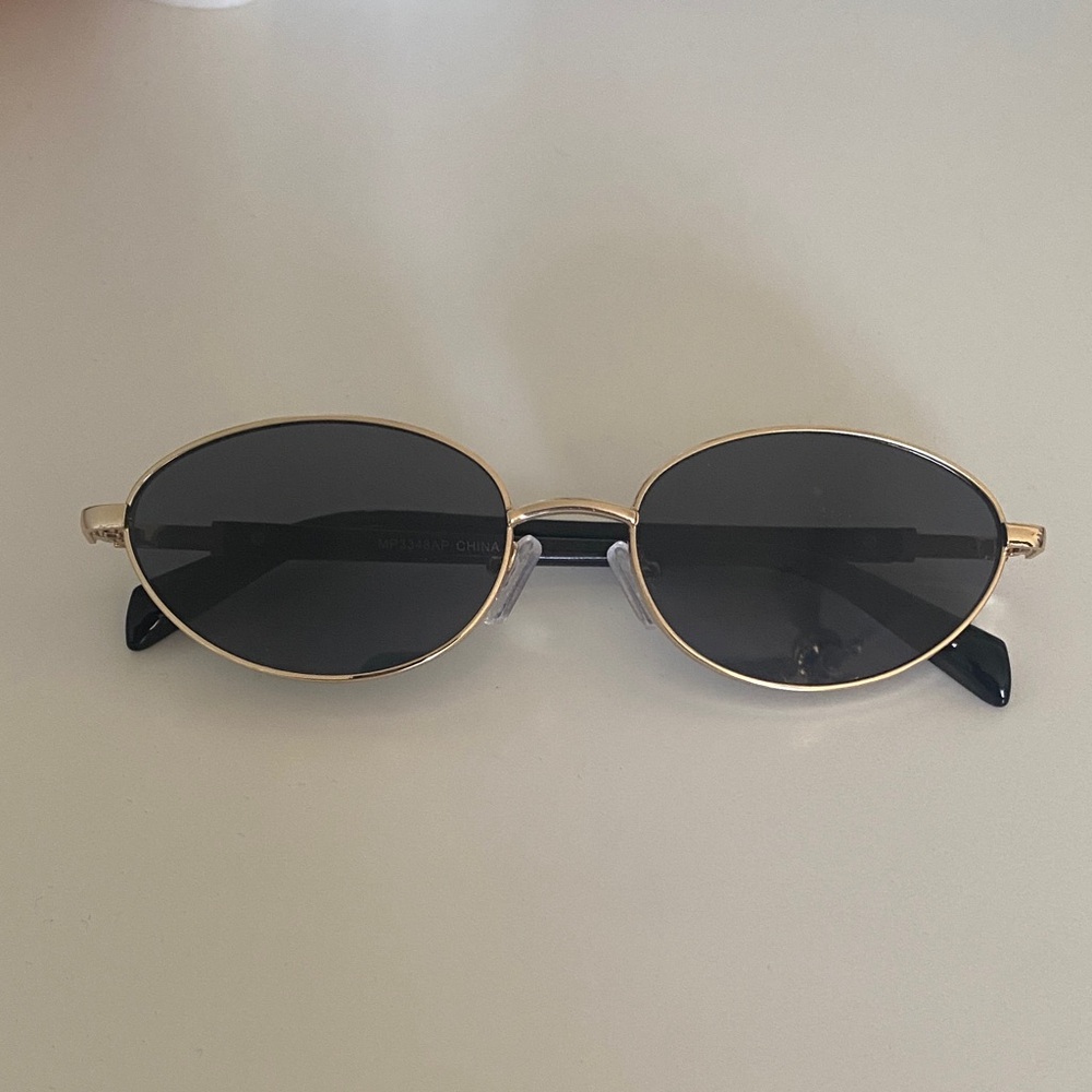 Gold and Black Oval Sunglasses